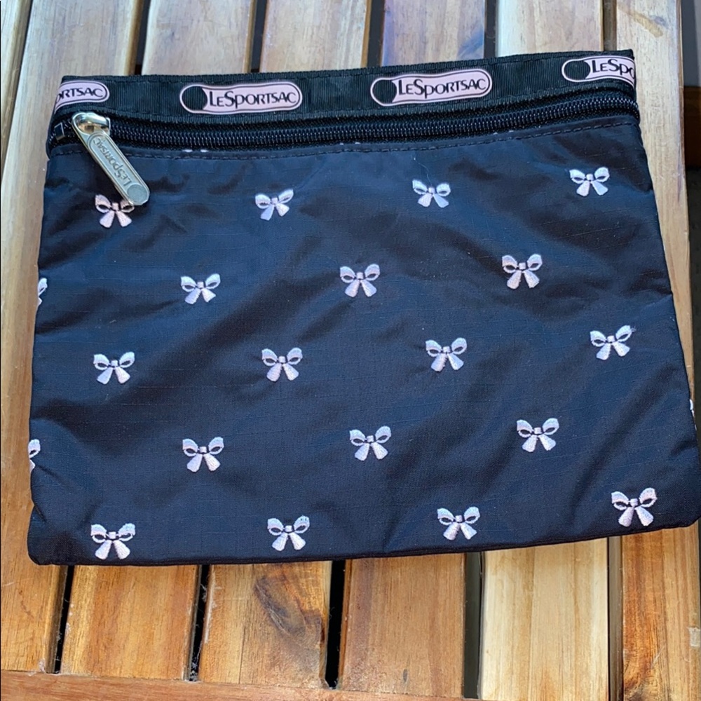 Black LeSportSac bag with pale pink embroidered bows